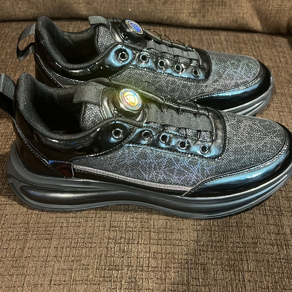 Stylish Black and Patent Leather Trim Sneakers with unique twist knob laces. - Picture 5 of 9